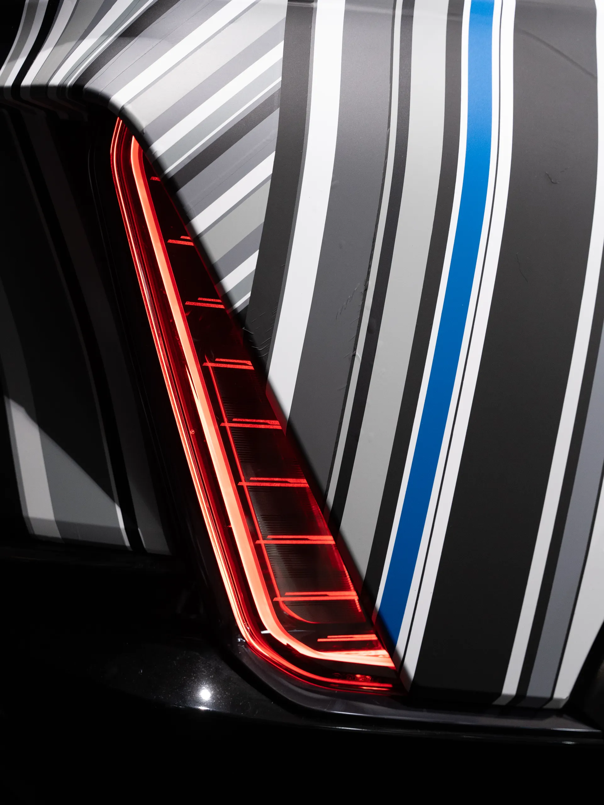 Sleek × Cadillac — black and white tape art car