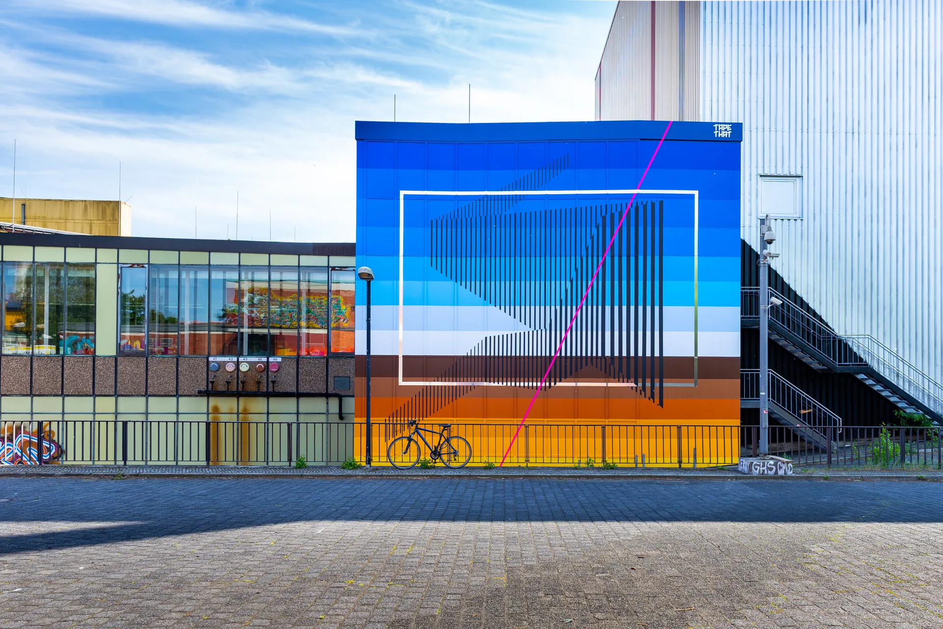 Berlin Mural — large-scale colorful tape art mural