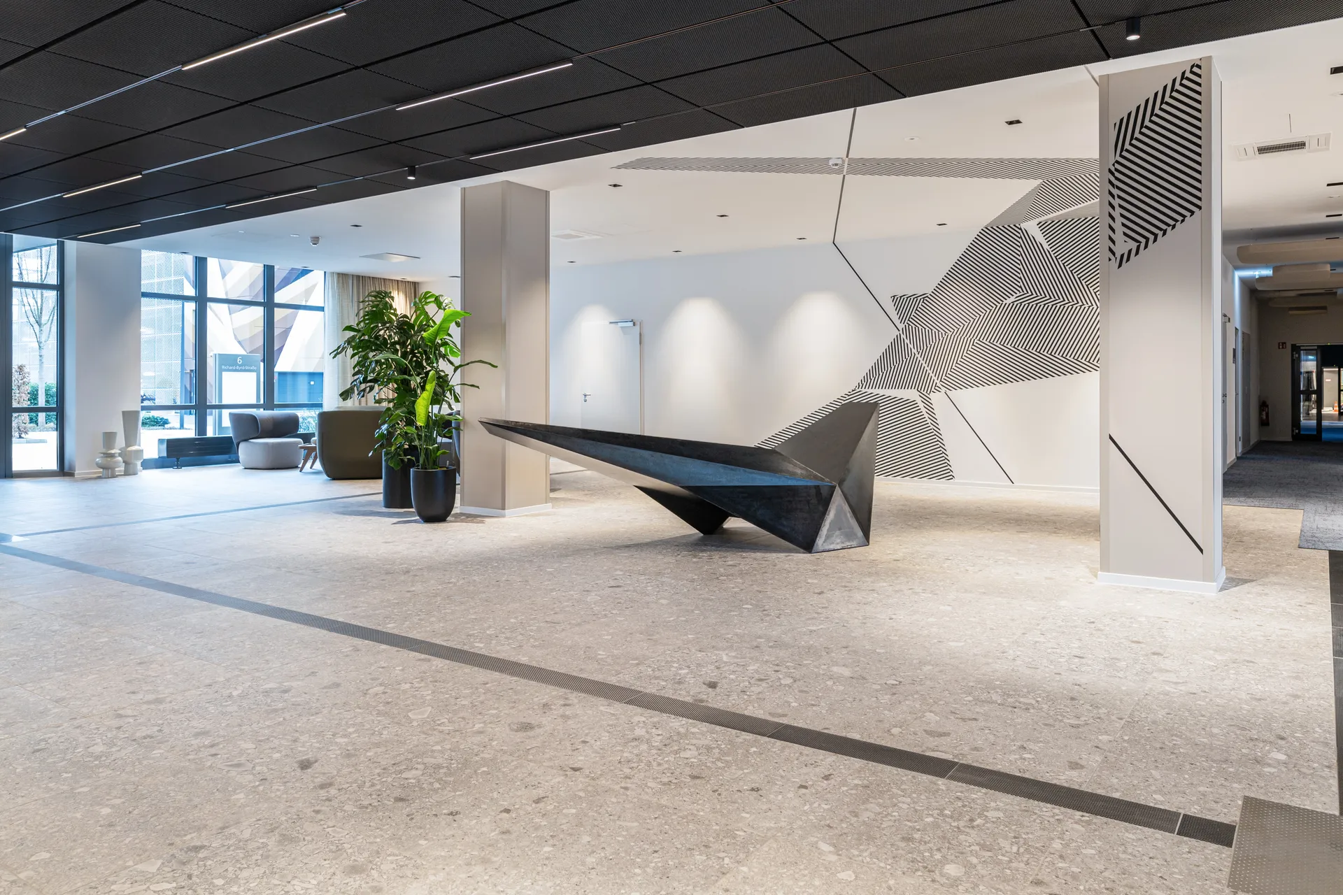 Coco Cologne — black and white tape stripes installation